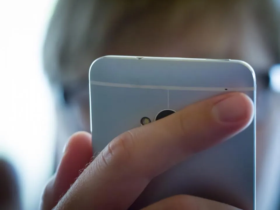 Hand holding a smartphone